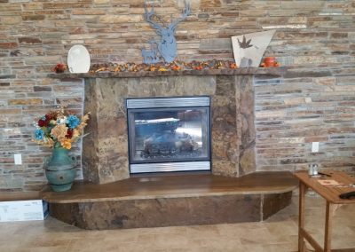 Natural Stone Fireplace mantle, hearth and pillars.